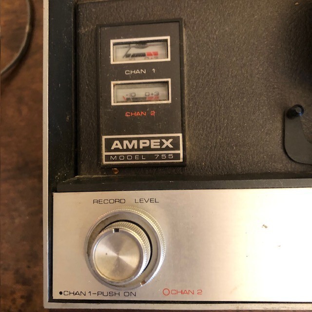 Ampex Model 55 reel-to-reel tape recorder in wooden housing.