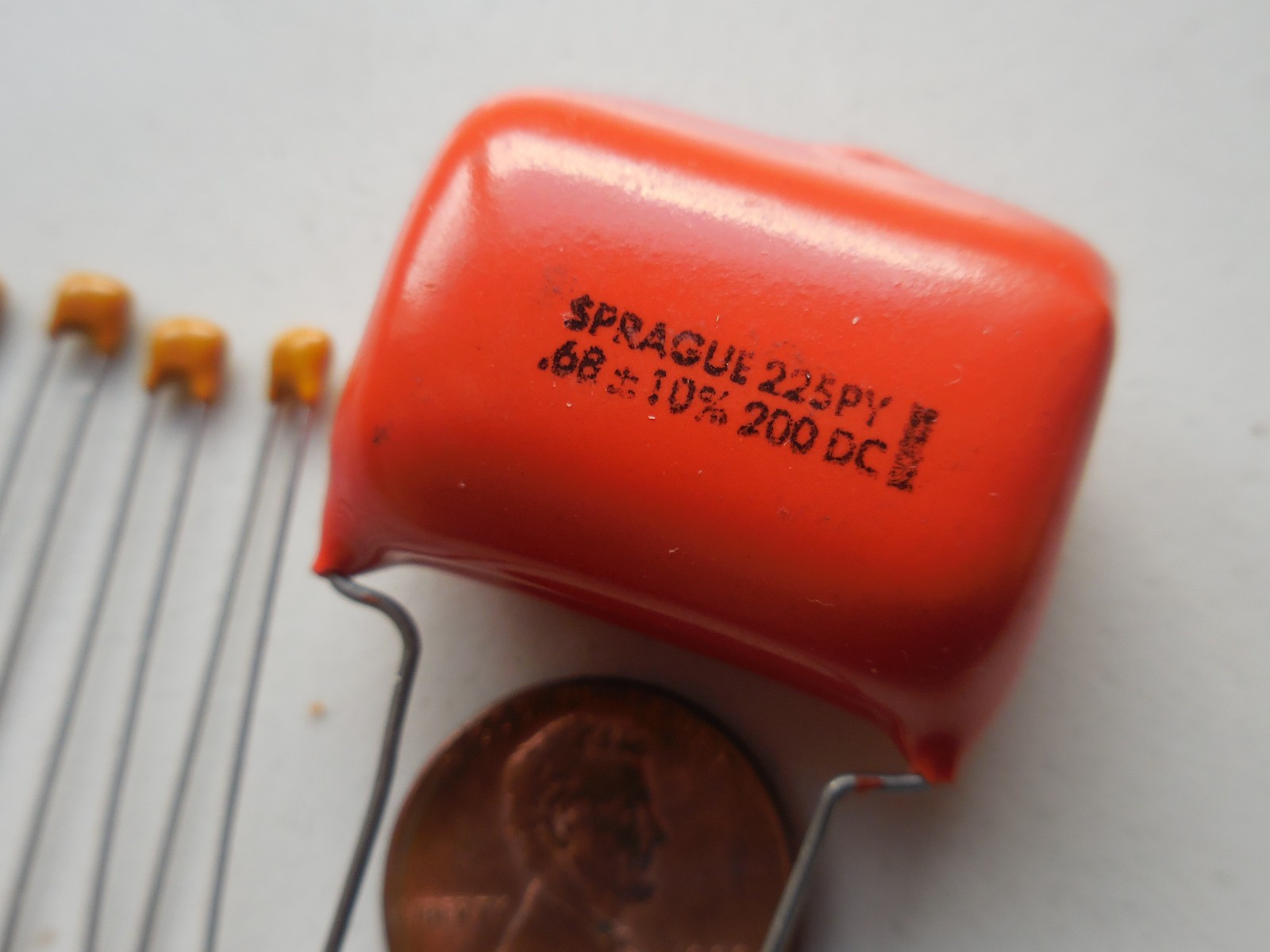 (1X) Sprague .68uf 200VDC 10% Orange Drop” With Bonus 5 Pcs. 104 caps Free