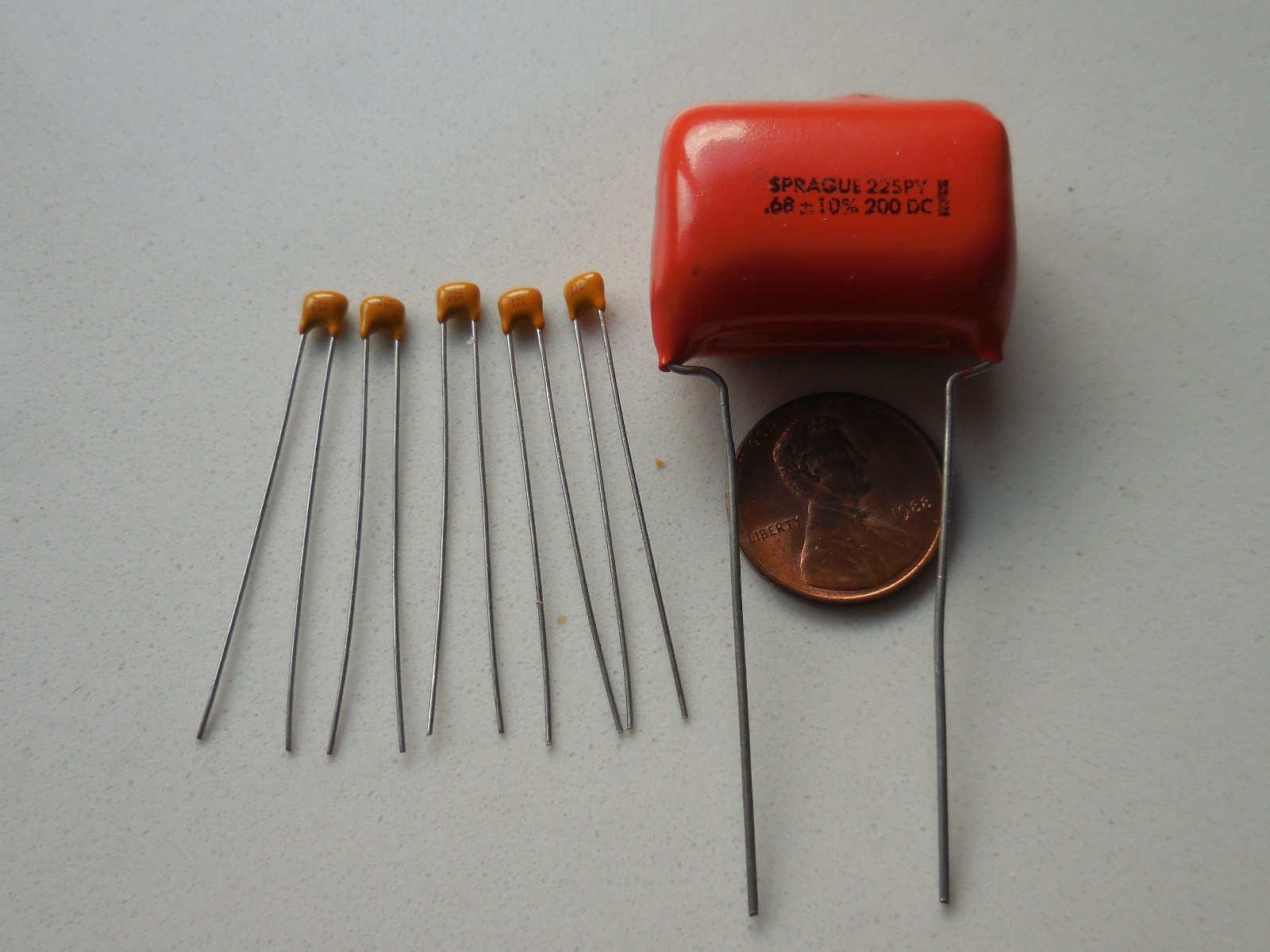 (1X) Sprague .68uf 200VDC 10% Orange Drop” With Bonus 5 Pcs. 104 caps Free