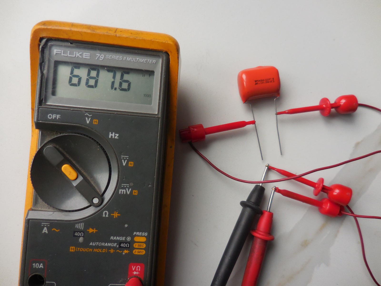 (1X) Sprague .68uf 200VDC 10% Orange Drop” With Bonus 5 Pcs. 104 caps Free
