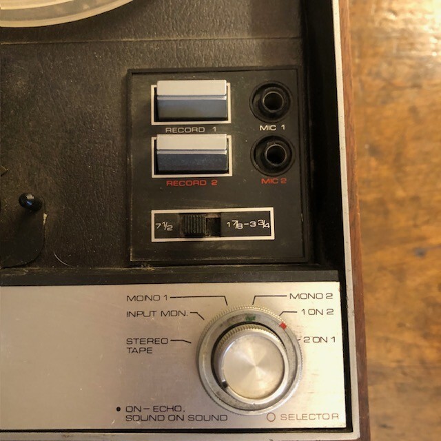 Ampex Model 55 reel-to-reel tape recorder in wooden housing.