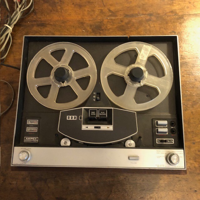 Ampex Model 55 reel-to-reel tape recorder in wooden housing.