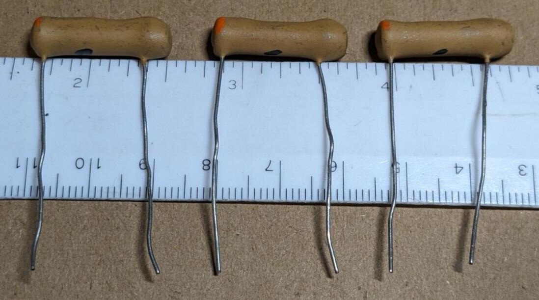 Lot of 3 NOS 75pF Dogbone Capacitors 500v Color Code: Violet-Green-Black-Orange