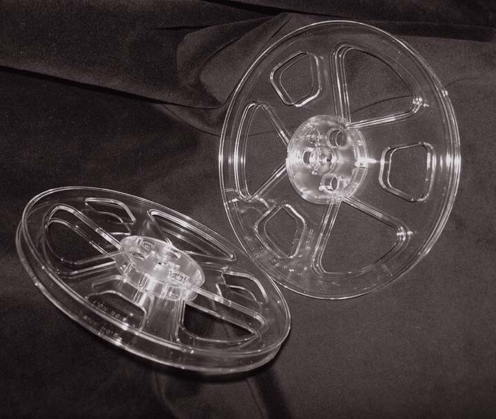 7″ x 1/4″ Clear plastic tape reel (1) with brand new hinged box