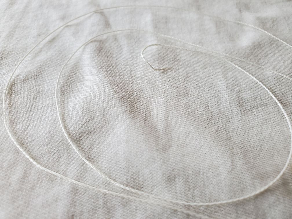Thin White Radio Dial Cord .2mm sold in 12 foot lengths