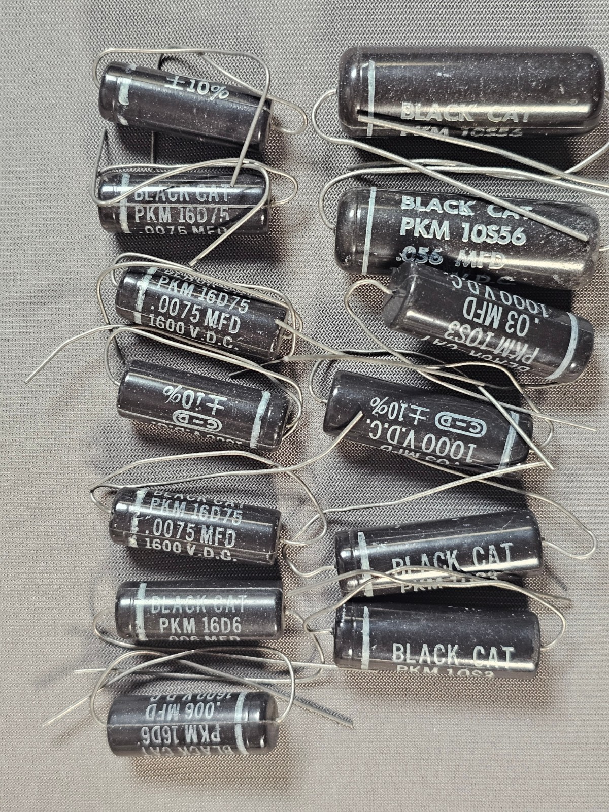 Lot of 13 Cornell Dubilier Black Cat Capacitors, 4 values NOS