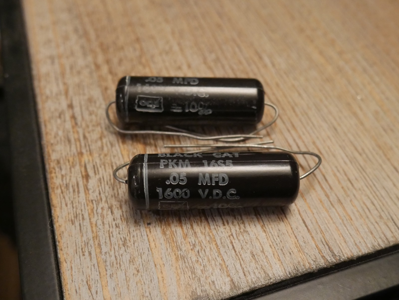2 NOS CDE Black Cat 0.05uF 1600V PKM 16S5 film capacitors Cornell Dubilier