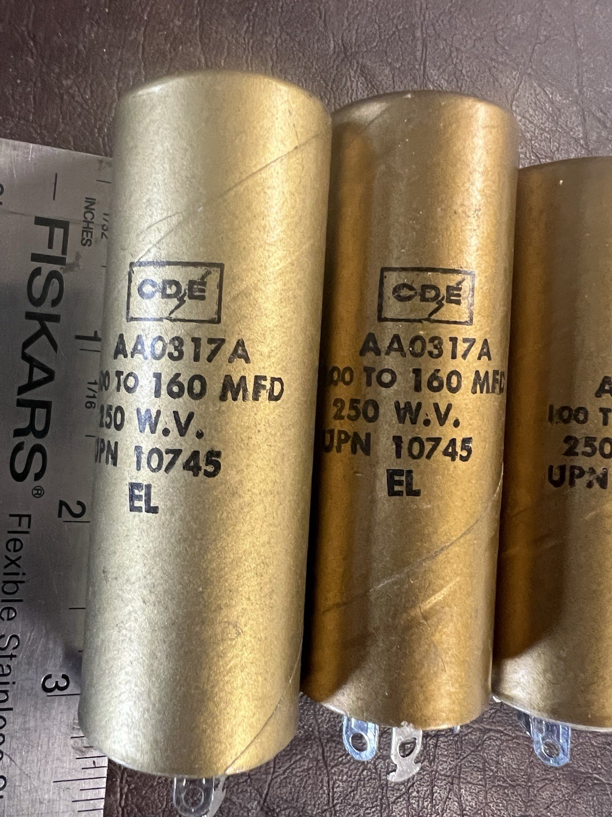Lot of 7 Vintage CDE Cornell-Dubilier AA0317A Gold Capacitors 100-160 MFD NOS
